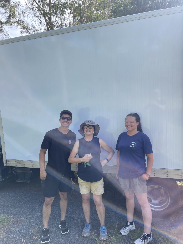 Relocation Rangers removalist carrying boxed contents to the truck