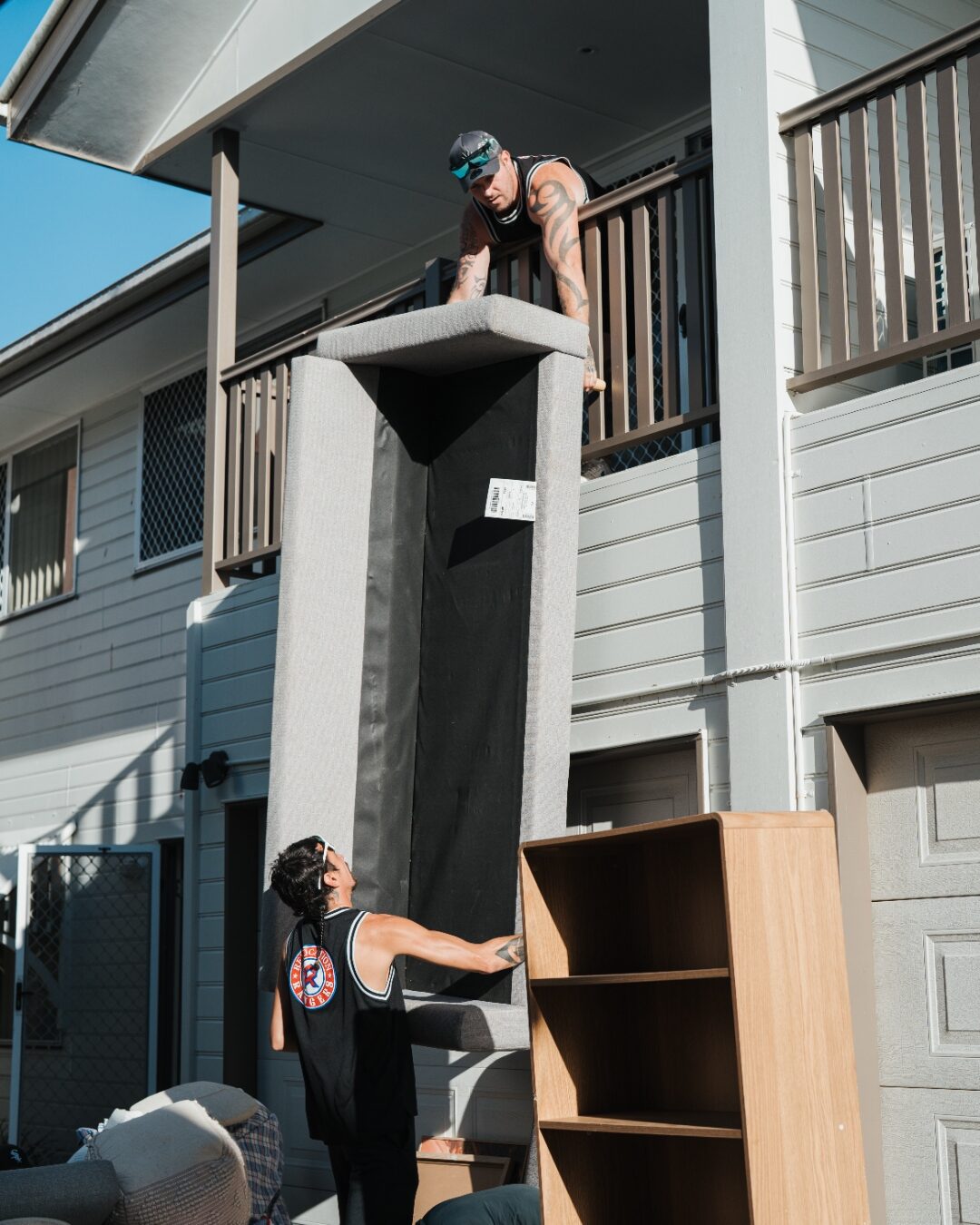 Relocation Rangers crew handling a tough balcony access couch removal in Brisbane