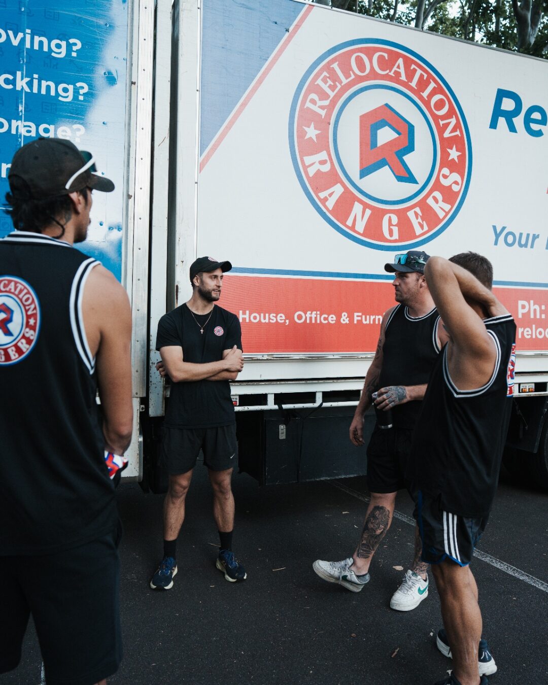 Luke the founder of Relocation Rangers briefing his Brisbane moving crew